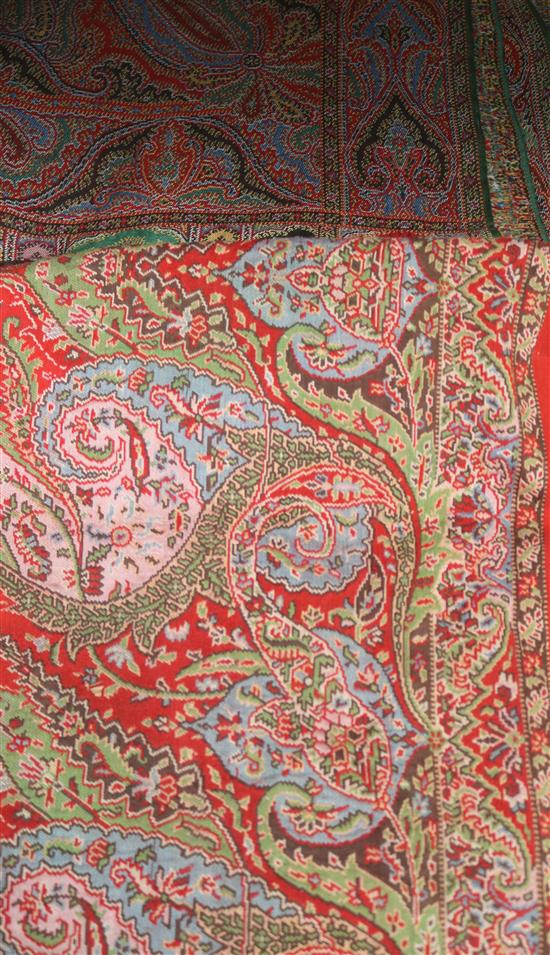 A 19th century Paisley shawl, another small shawl and a block printed Indian cotton cover